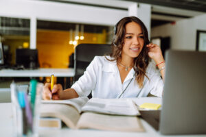 Distance learning. Young business woman, student, teacher. E-learning education concept.